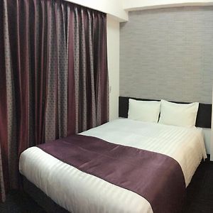 Kamer met een Queen Size Bed