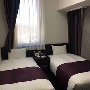 Kleine Kamer met Twee Aparte Bedden